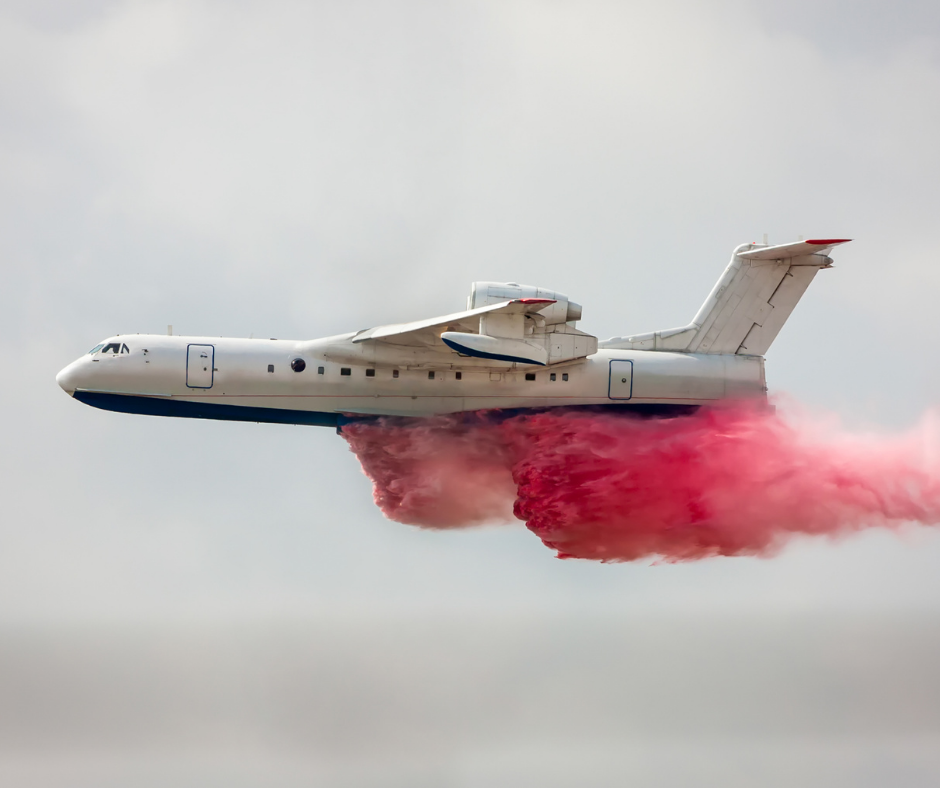 This image has an empty alt attribute; its file name is day-29-plane-with-fire-retardant.png